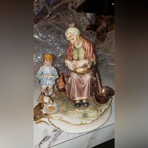 Rare collectible Ceramic Grandmother & Child Sculpture in Brown and Cream Tones
